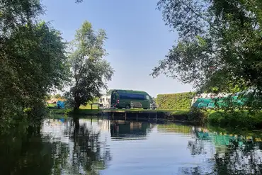 Riverside non electric grass pitches at Rushbanks Farm Caravan and Camping Site