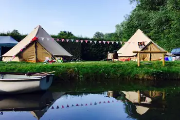 Hire a bell tent, pop your things inside, then relax!