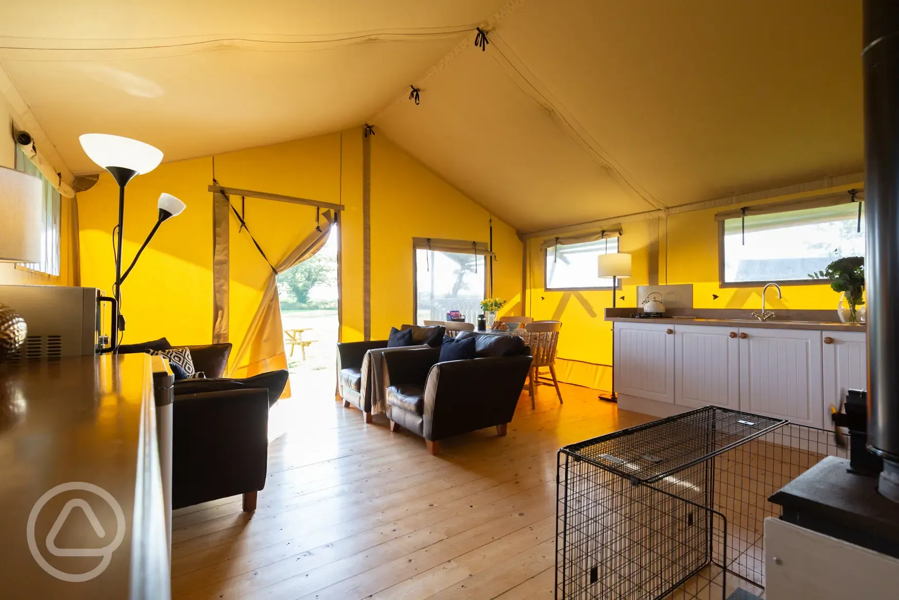 Glamping life made easier with electricity, fridge, microwave. Comfy living area