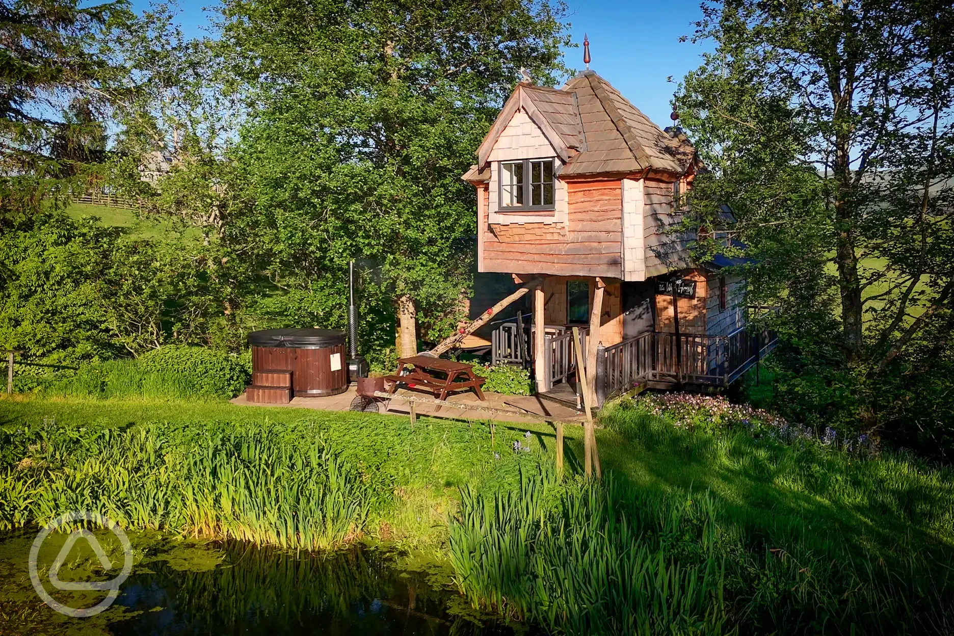 Wee Tree Howf Treehouse with pond views and an optional wood-fired hot tub
