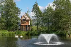 Wee Tree Howf Treehouse with pond views