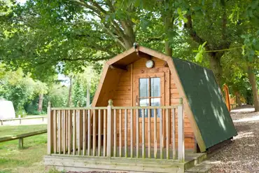 Cocoon camping pod with a small decking area