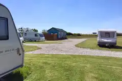 Electric hardstanding pitches with 10 amp hook up 7m x 3.5m