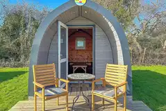 Camping pod (four person) with small decking and outdoor seating Camping pod (four person) with small decking and outdoor seating