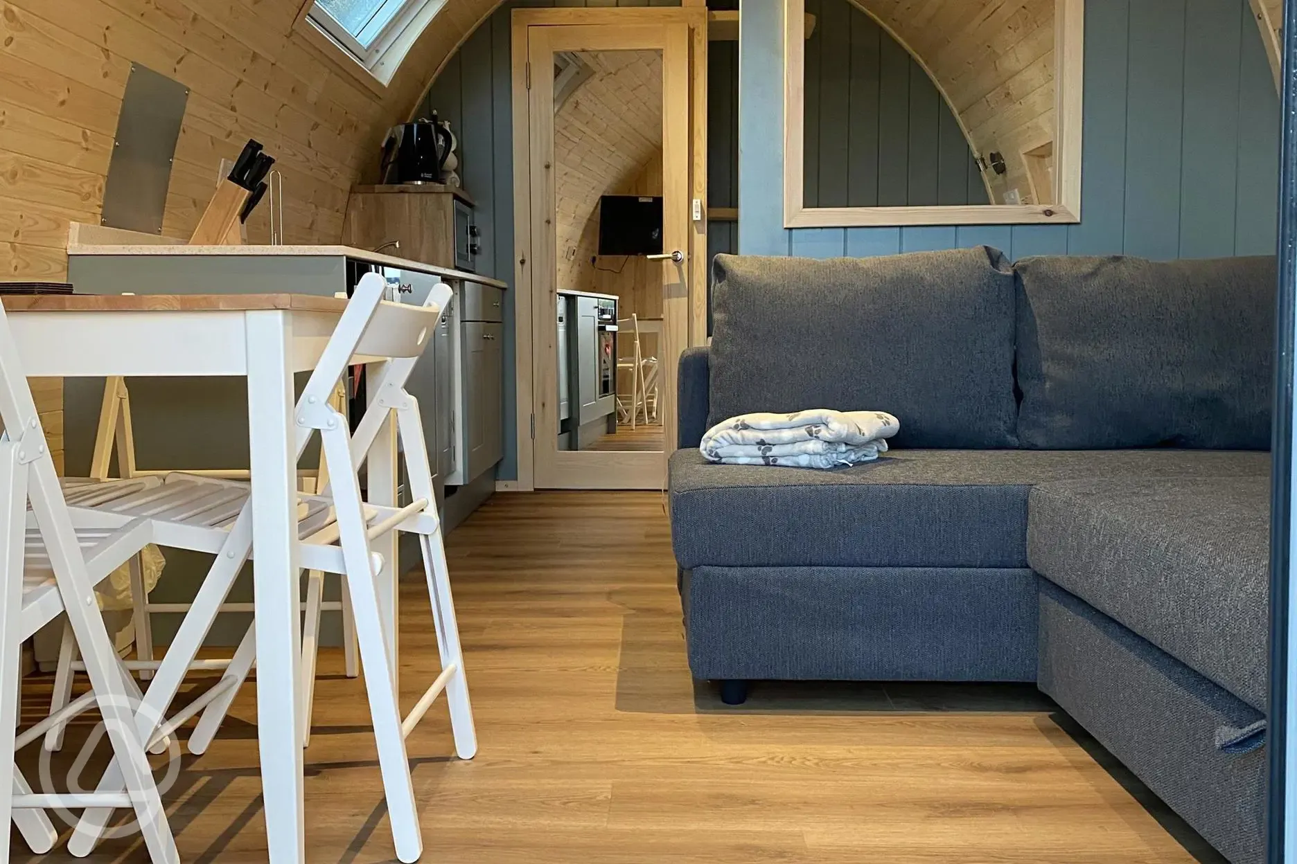 Mega ensuite glamping pod dining and living area