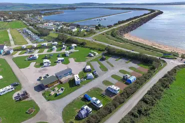 Aerial view of Harbour Lights overlooking Haverigg Beach sea