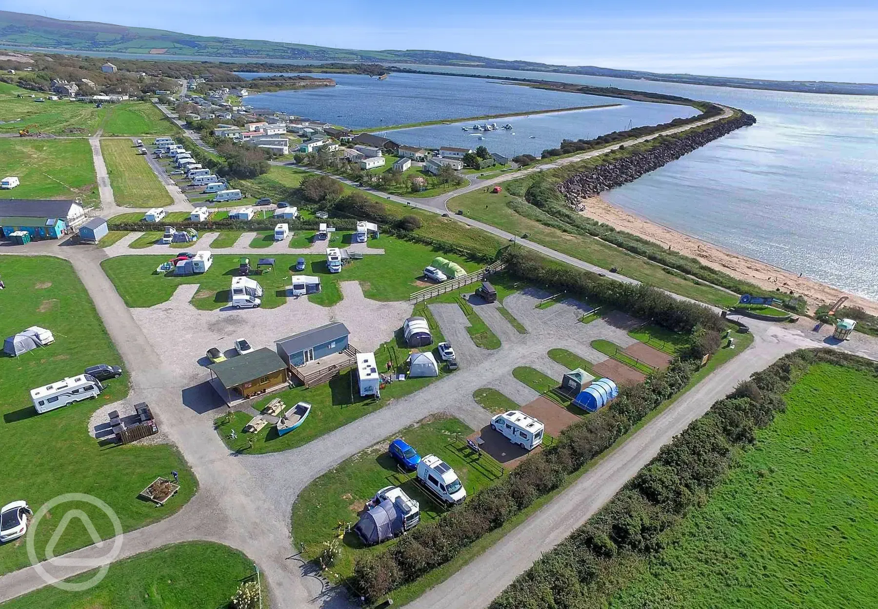 Aerial view of Harbour Lights overlooking Haverigg Beach sea