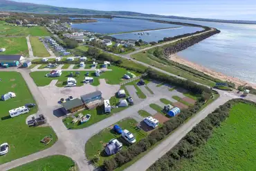 Aerial view of Harbour Lights overlooking Haverigg Beach sea