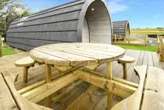 Mega glamping pod with outdoor deck and bench Mega glamping pod with outdoor deck and bench