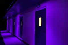 Facilities block lit up at night 