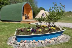 Camping pods with parking space for one vehicle