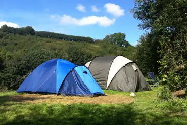 Sun of a pitch with 2 tents