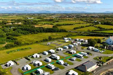 Aerial of Bryn Ednyfed Caravan Site towards the mountains