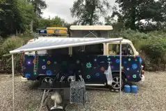 Campervan on the electric hardstanding pitches Campervan on the electric hardstanding pitches