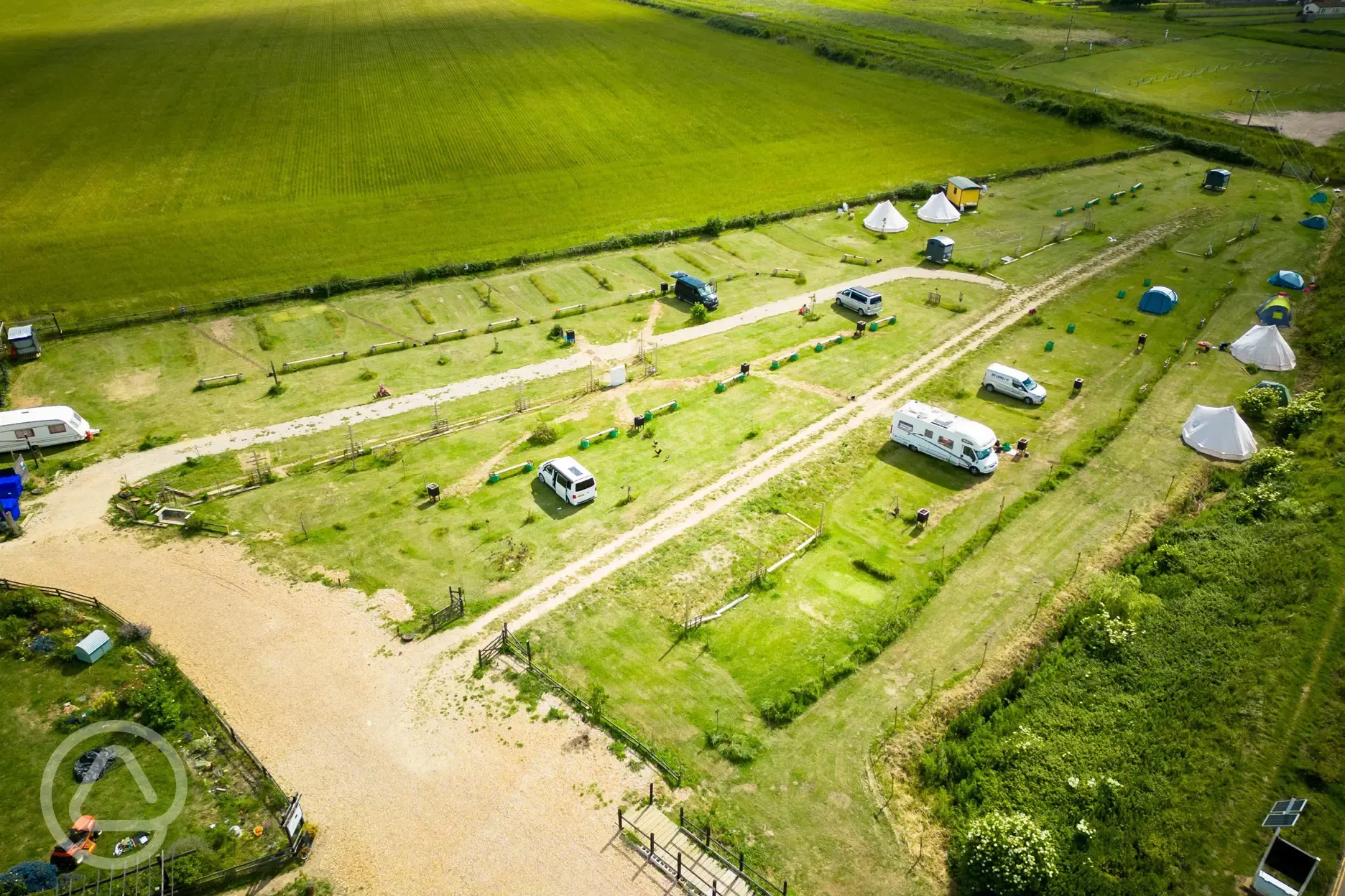 Close up aerial of site and adjacent Wild Ken Hill farm land