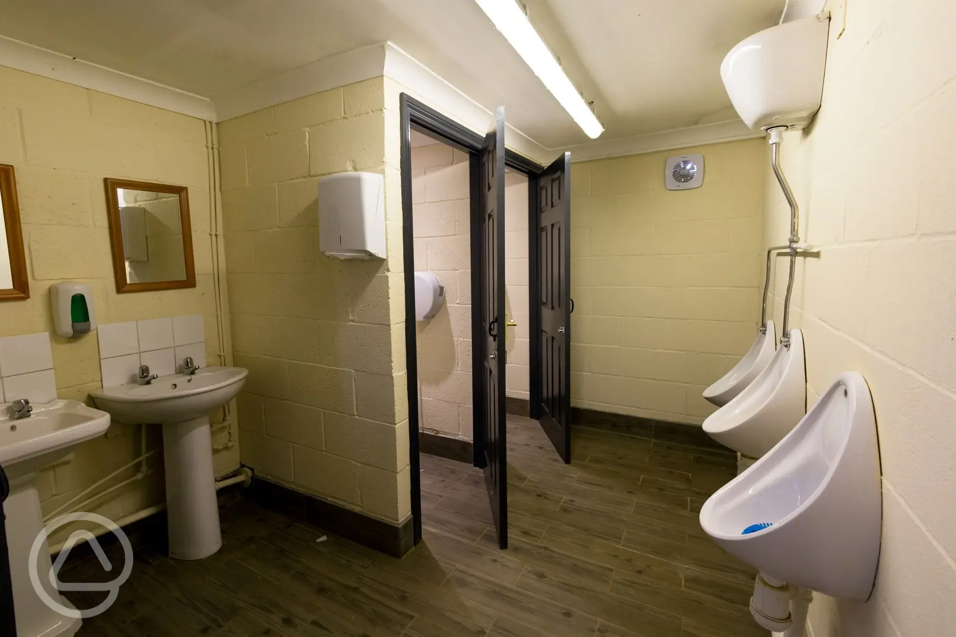 Men's toilets with 2 cubicles urinals, unisex also available