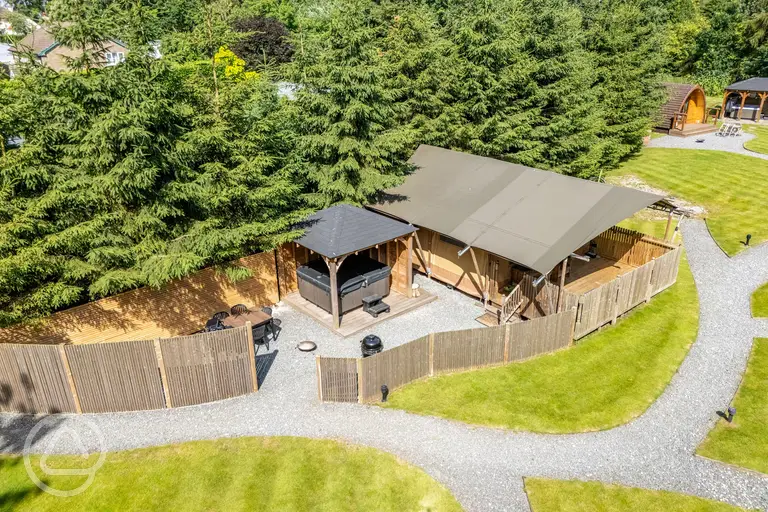 Ensuite safari tent with private decking and sheltered hot tub