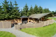 Ensuite safari tent with private decking and sheltered hot tub