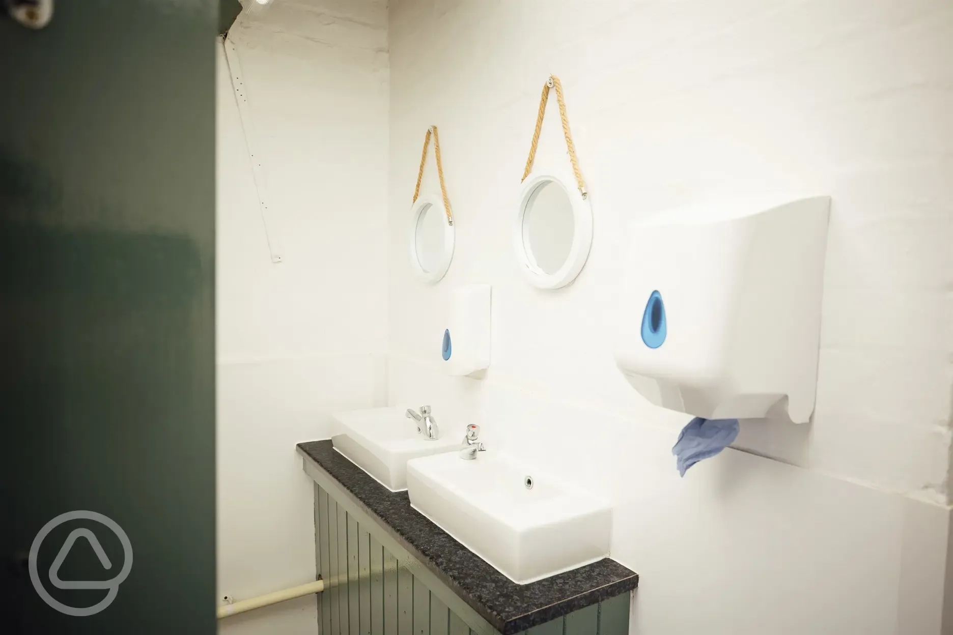 Sinks in the facility block with mirrors