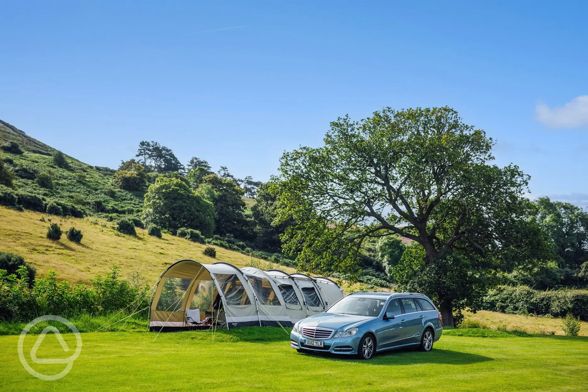 Non electric grass pitches at Trwyn yr Wylfa Camping Site