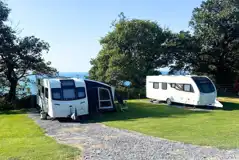 Electric gravel pitches with awning space