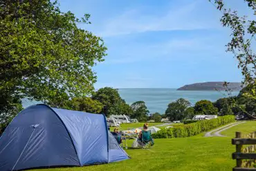 Non electric grass pitches for tents and small campervans with sea views