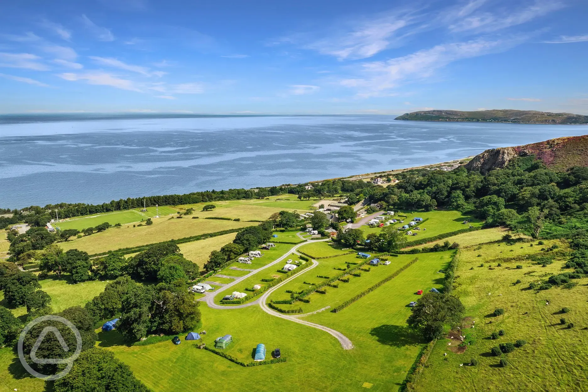 Trwyn yr Wylfa Campsite Site aerial overlooking Penmaenmawr Beach