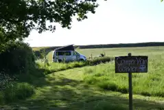 Campervan corner with a west facing pitch Campervan corner with a west facing pitch