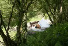 Bluebell bell tent (dog friendly) on a raised decking and surrounded by woodland Bluebell bell tent (dog friendly) on a raised decking and surrounded by woodland