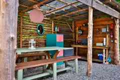 Dome kitchen with crockery, cutlery, and seating Dome kitchen with crockery, cutlery, and seating