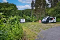 Caravan and campervan on the Upper Terrace touring pitches