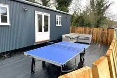 Shepherd's hut and table tennis table