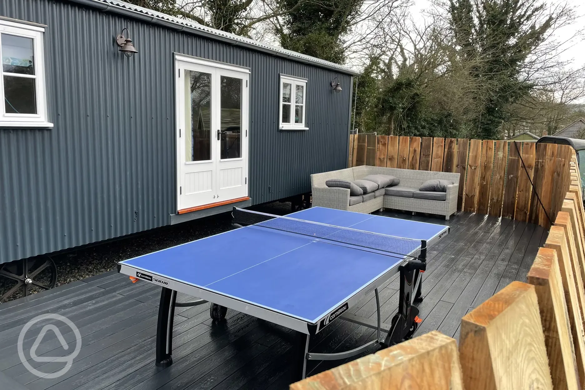 Shepherd's hut and table tennis table
