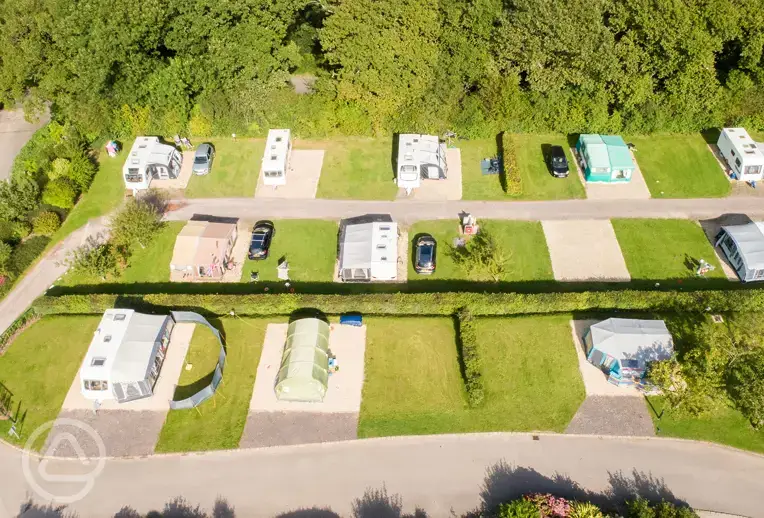 Aerial of the electric hardstanding pitches with borders for privacy