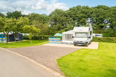 Electric hardstanding pitches measuring 8m by 6m with 16 amp electric