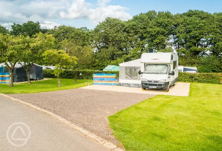 Electric hardstanding pitches measuring 8m by 6m with 16 amp electric