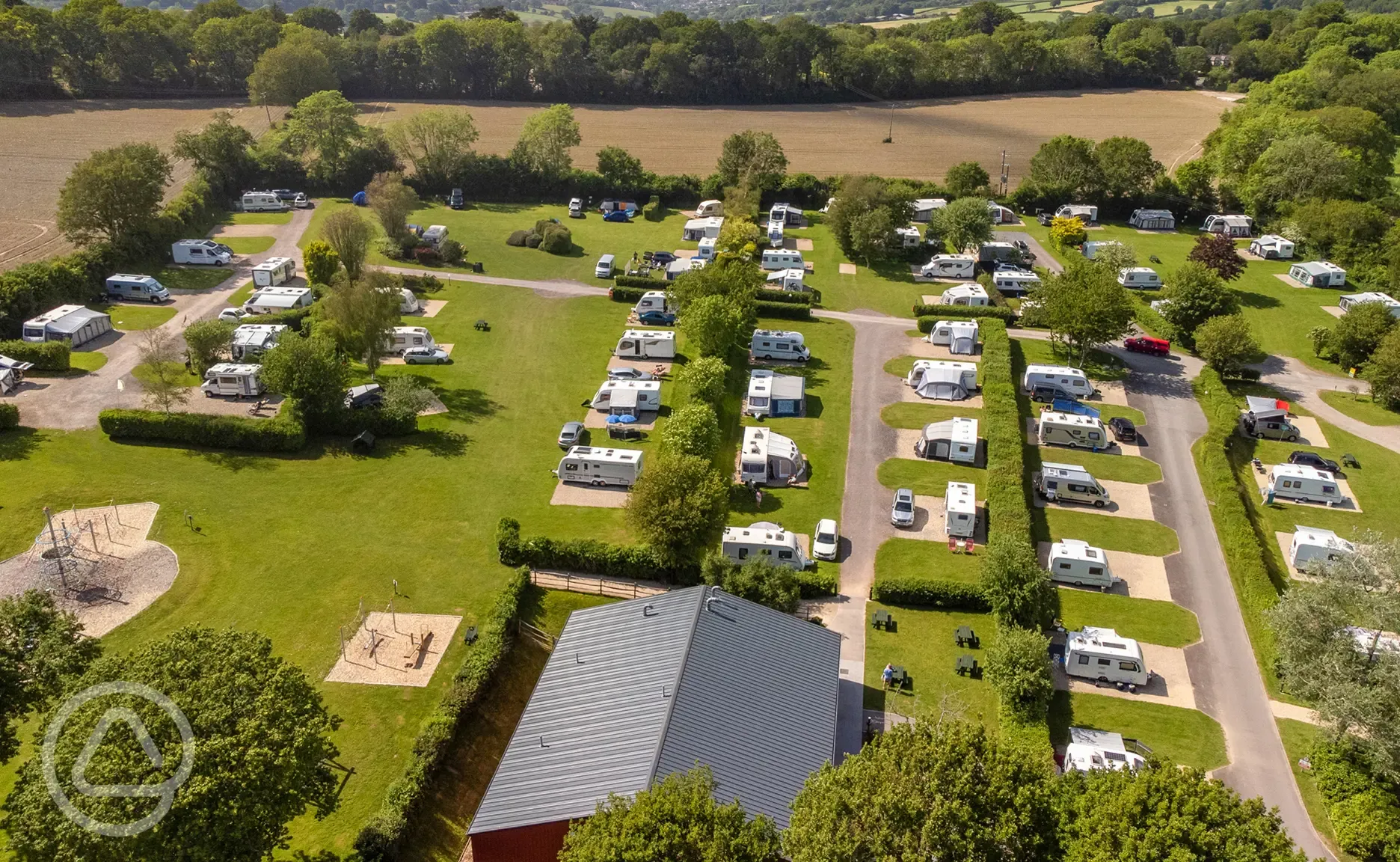 Aerial of the hardstanding pitches and fields at Monkton Wyld Holiday Park