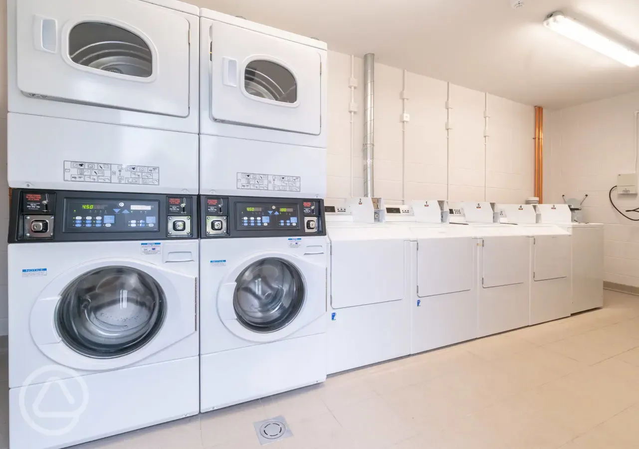 Laundry area with washers and dryers