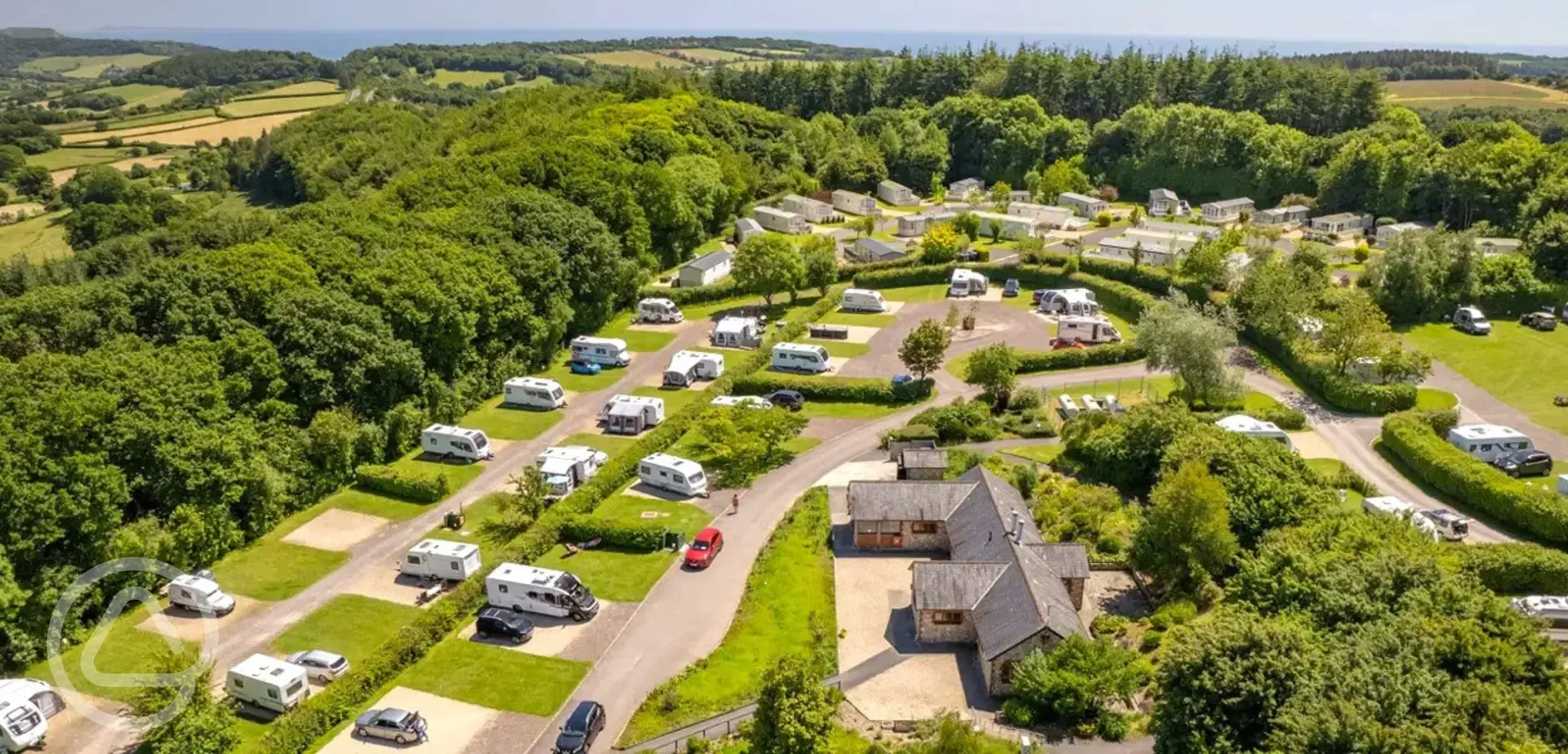 Aerial view of Monkton Wyld Holiday Park, surrounded by countryside
