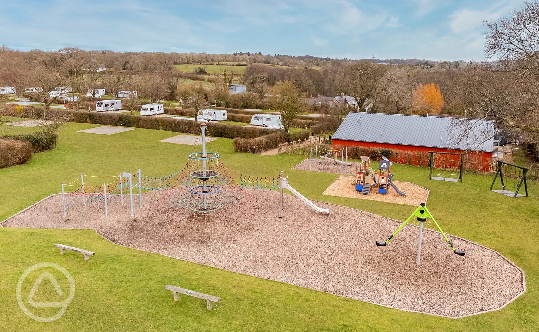 Children's playground with climbing frames and slides