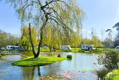 Waterside pitches at Everglades Caravan Park and Fishing Lodges