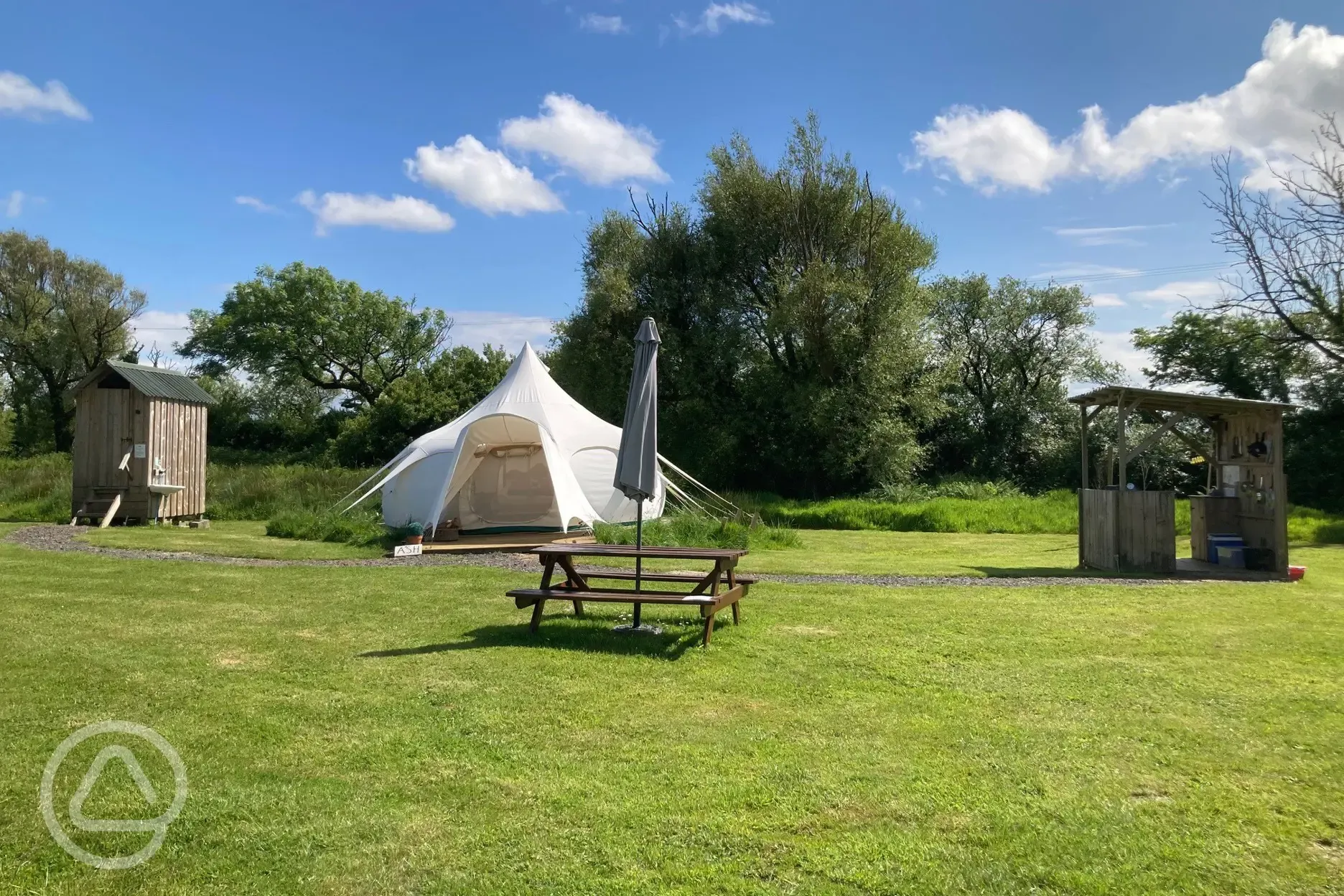 Lotus belle tent and outdoor seating area