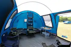 Ready tent interior with an optional kitchen pack for an added fee