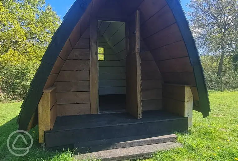 Unfurnished camping pod, sleeping two