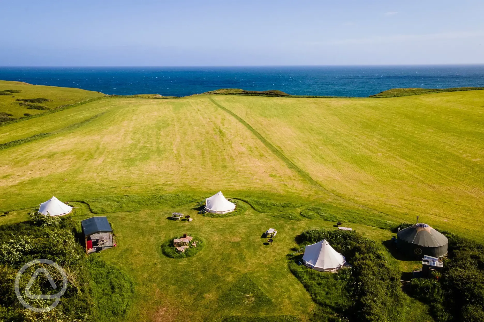 Aerial view of the glamping by the coast