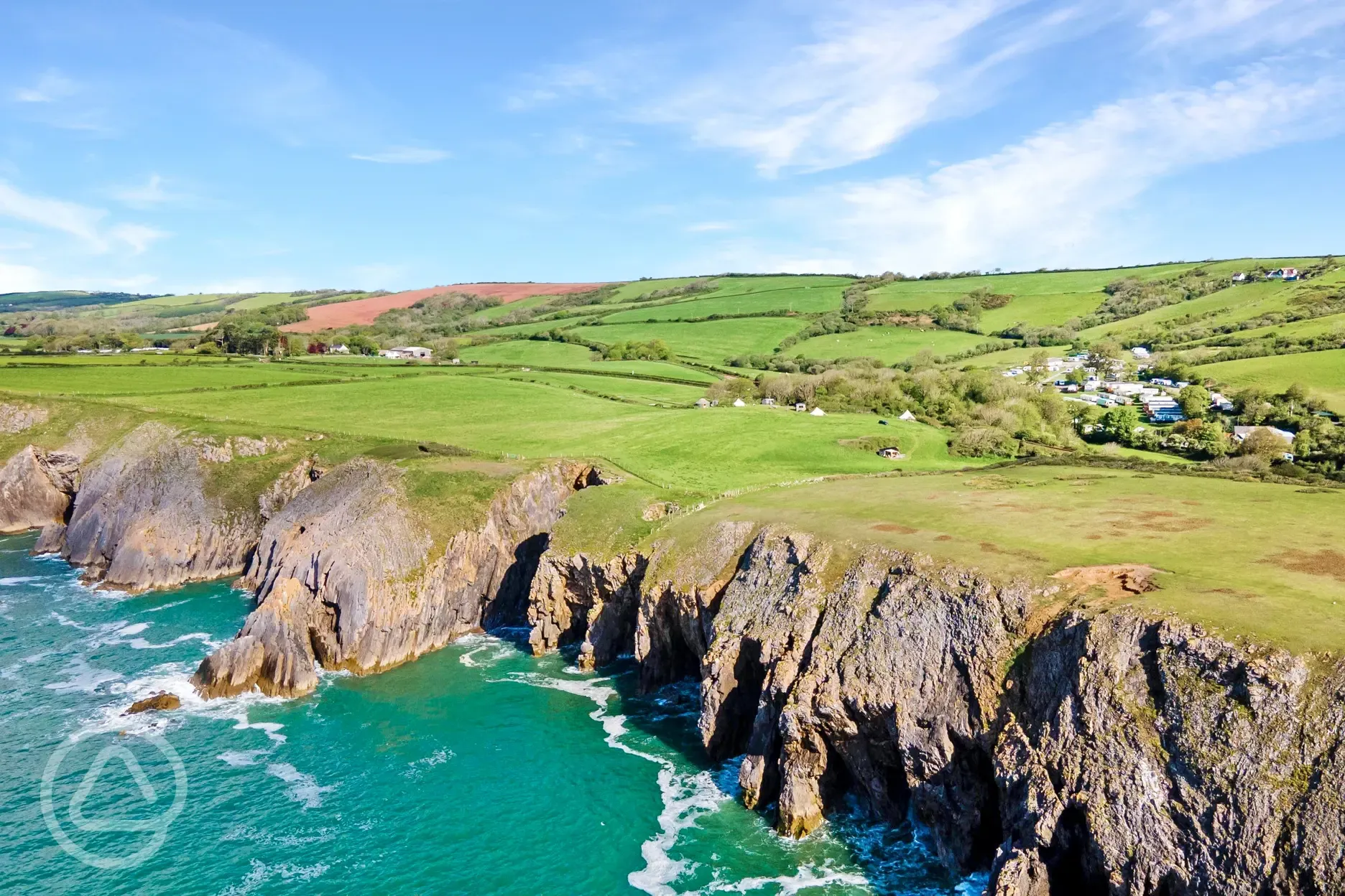 Aerial of the site by the coast