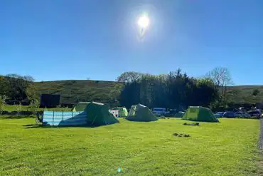Non electric grass pitches for two smaller or one family tent only