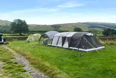 Large non electric grass pitches for up to two larger or three smaller tents Large non electric grass pitches for up to two larger or three smaller tents
