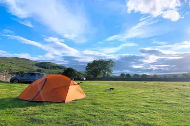 Non electric grass pitches with countryside views at Stablefell Campsite