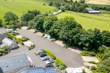 Aerial of Farditch Farm Caravan Park with farmland surroundings